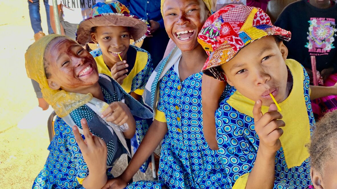 Nama children are happy about their dance performance