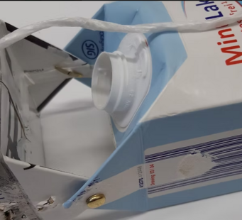 Foto_Befestigung &uuml;ber Ecken am Tetra Pak